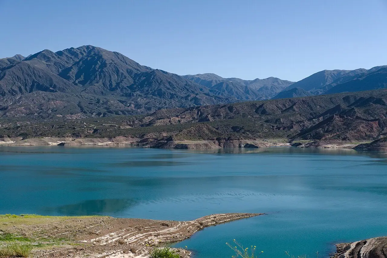 Embalse Potrerillos reservoir and surrounding mountains viewed from Route 7