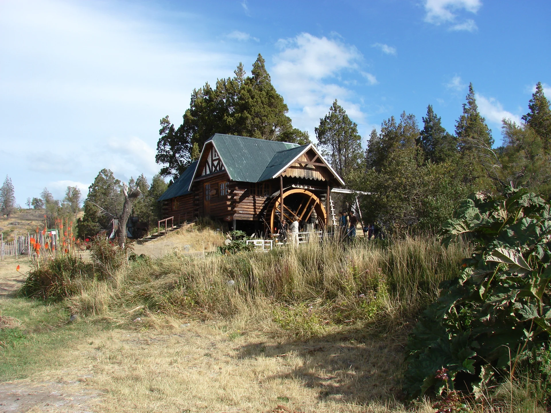 A timber Welsh mill with a waterwheel and garden in the Trevelin area, photographed February 11, 2009