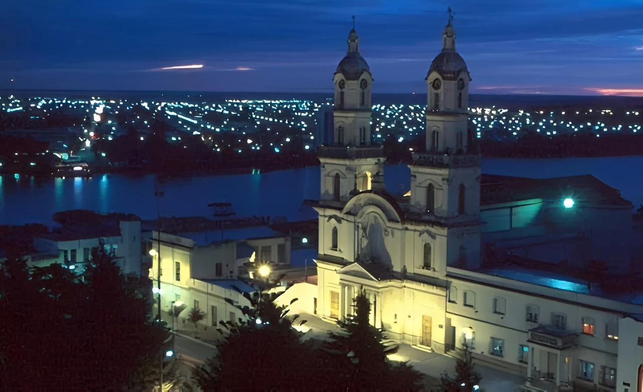 The church in Carmen de Patagones, with Viedma lights across the Río Negro